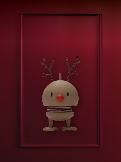 Su sfondo rosso è raffigurato un paio di guanti beige con finiture in pelliccia bianca. Sopra, in caratteri bianchi, si legge il testo "PICCOLI REGALI".