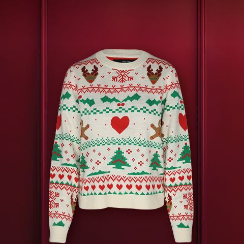 Un festoso maglione natalizio con renna, naso a pompon rosso e sciarpa a motivi rossi e bianchi su sfondo rosso scuro. In alto si legge la scritta "NATALE BRUTTO".